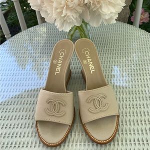 CHANEL Cream Canvas CC Slide Mule Wedges